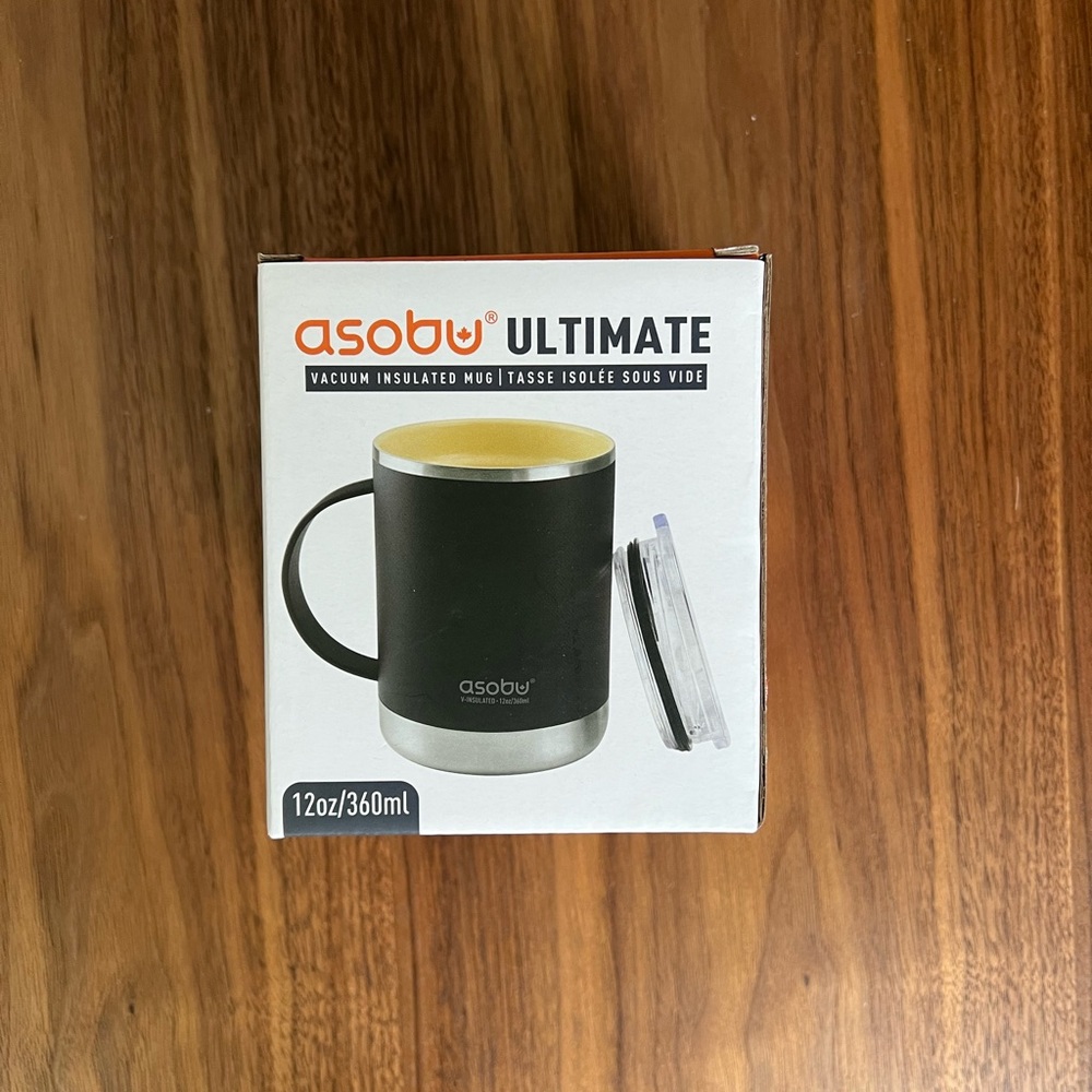 BRAND NEW Asobu vacuum insulated mug. Black with stainless bottom. Still in box.
